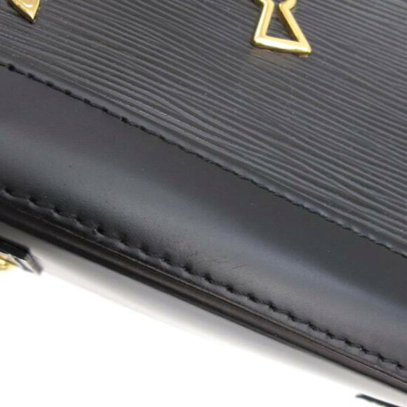 Louis Vuitton Epi Alma Love Lock